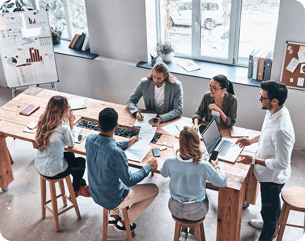 Team meeting in a modern office space where everyone belongs